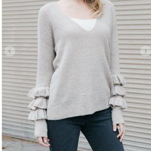 Sweater with ruffle detailed sleeve